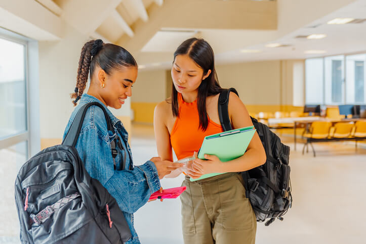 A student helping another through the Student Ambassador Program