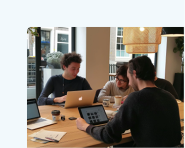 Team reviewing reports